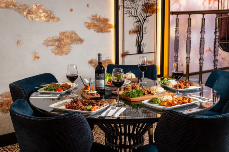An intimate table for two in blue velvet